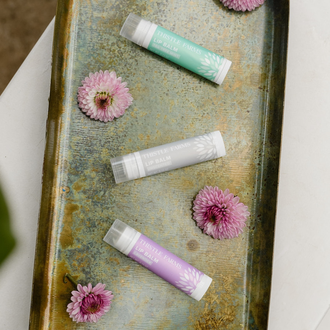 Thistle Farms - Organic Shea Butter & Beeswax Lip Balm -  Lavender