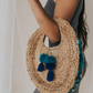 Jute Round Handbag with Blue Pom Pom Tassel and Upcycled Sari Trim